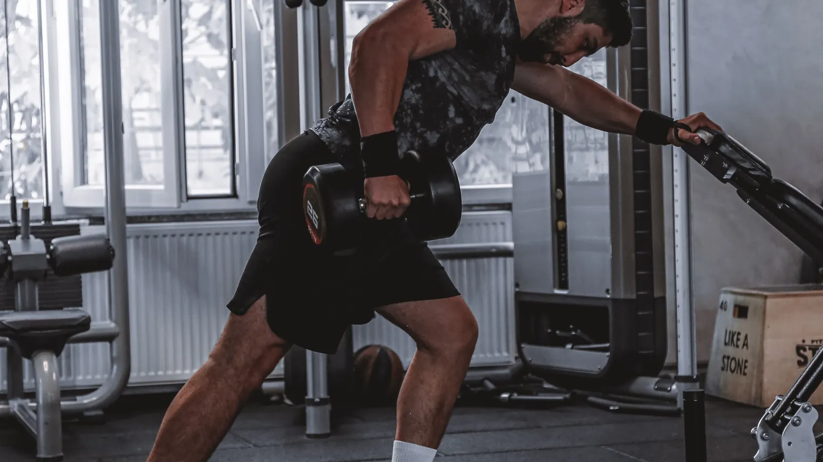 Athlete performing a single-arm dumbbell row